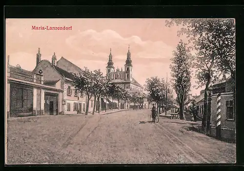 AK Maria-Lanzendorf, Strassenpartie mit Kirche