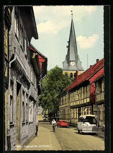 AK Northeim, Hagenstrasse mit Kirche und Radfahrer