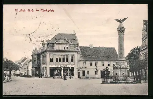 AK Kirchhain /N.-L., Marktplatz mit Geschäftshaus Druschke und Denkmal