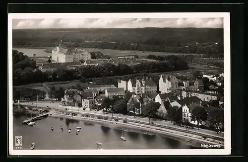AK Schleswig, Teilansicht mit Hafen und Booten