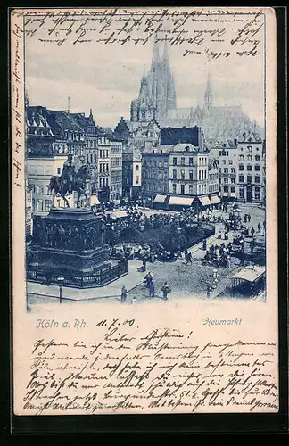 AK Köln a. Rh., Menschen am Denkmal auf dem Heumarkt, der Dom im Hintergrund
