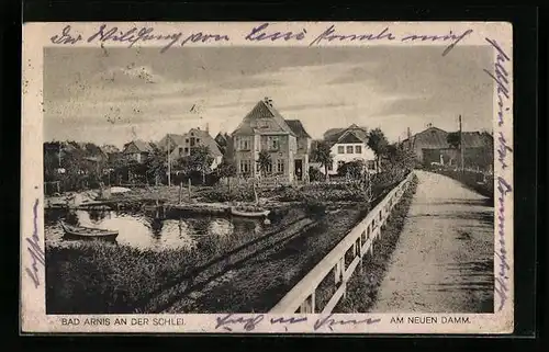 AK Bad Arnis an der Schlei, Strassenpartie mit Fluss und Booten