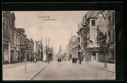 AK Insterburg, Hindenburgstrasse mit Apotheke