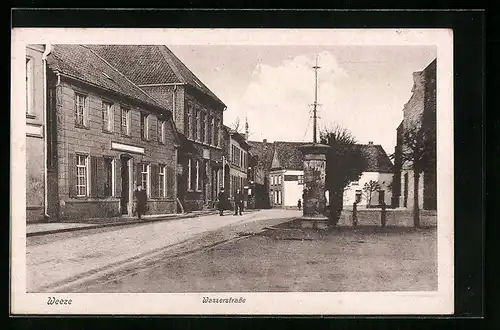 AK Weeze, Wasserstrasse mit Litfasssäule