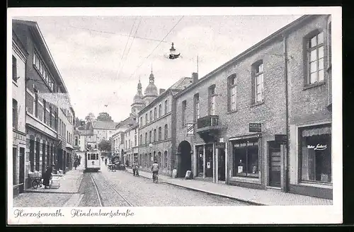 AK Herzogenrath, Hindenburgstrasse mit Geschäften und Strassenbahn