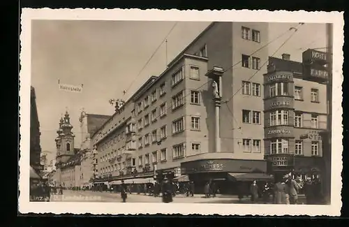 AK Linz a. D., Landstrasse mit Geschäften und Apotheke