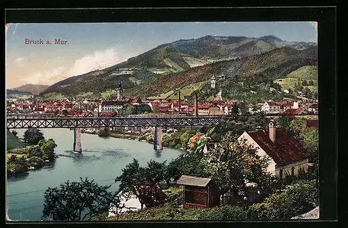 AK Bruck a. Mur, Uferpartie mit Kirche und Brücke