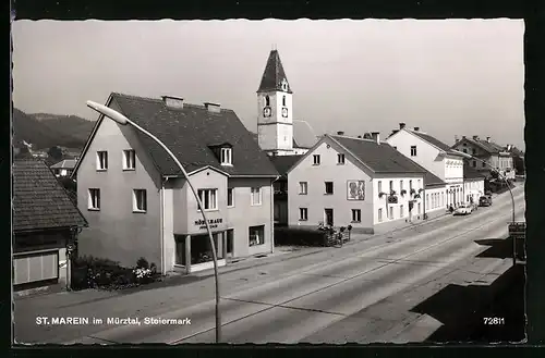 AK St. Marein im Mürztal, Strassenpartie mit Möbelhaus und Kirche