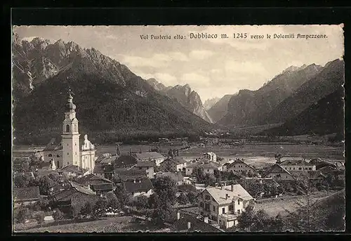 AK Dobbiaco, Ortsansicht mit den Dolomiten Ampezzane