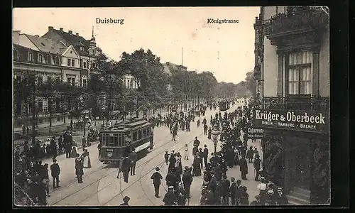 AK Duisburg, Königstrasse mit Zigarrengeschäft Krüger & Oberbeck und Strassenbahn