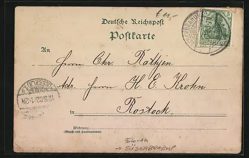 Foto-AK Süderbrarup, Strassenpartie mit Kirche