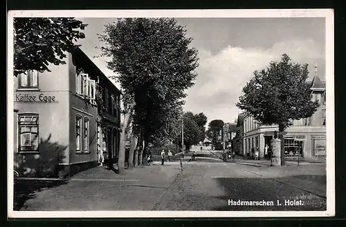 AK Hademarschen i. Holst., Strassenpartie mit Cafe Egge und Geschäft