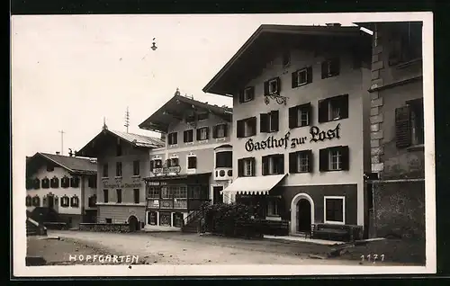 AK Hopfgarten, Strassenpartie mit Gasthof zur Post