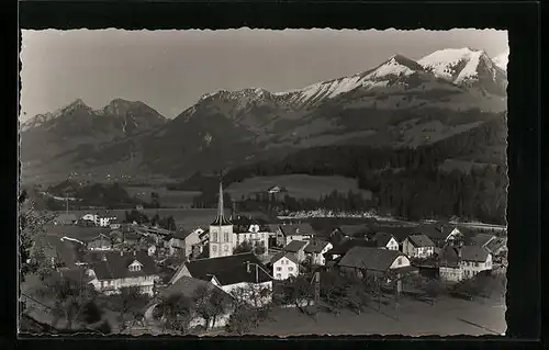 AK Neirivue, Ortsansicht mit Bergen
