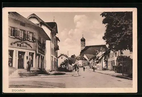 AK Stockach, Strassenpartie mit Zigarrengeschäft und Kirche