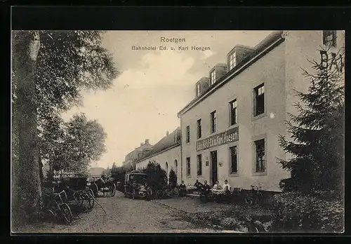 AK Roetgen, Bahnhotel Ed. und Karl Hoegen mit Automobil und Strasse