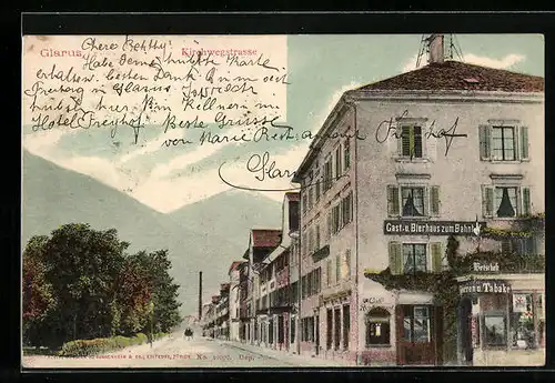 AK Glarus, Kirchwegstrasse mit Gasthaus zum Bahnhof