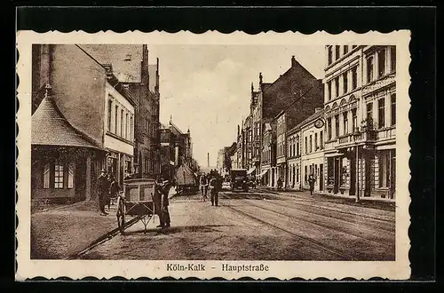 AK Köln-Kalk, Hautpstrasse mit Radfahrer