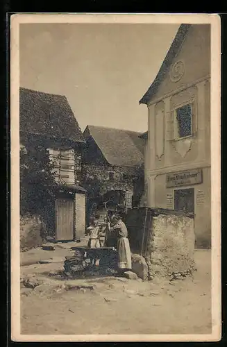 AK Ober-Arnsdorf i. d. Wachau, Anwohner am Brunnen vor der Bäckerei