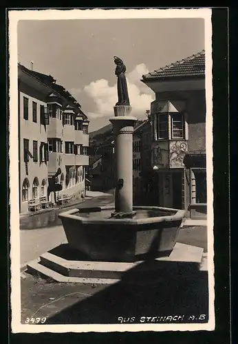 AK Steinach, Strassenpartie mit Brunnen