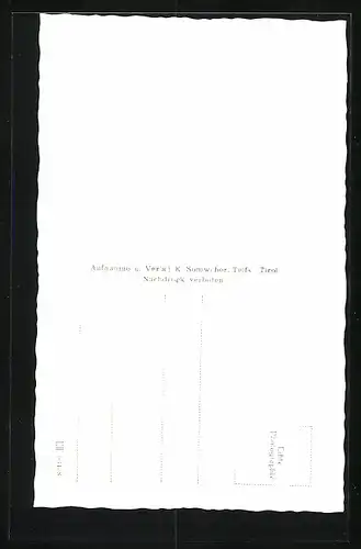 AK Telfs, Strassenpartie mit Geschäft