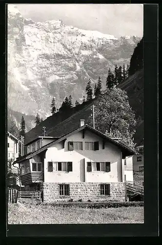 AK Unterschächen am Klausenpass, Kath. Ferienkolonie Brunnital Dorfblick