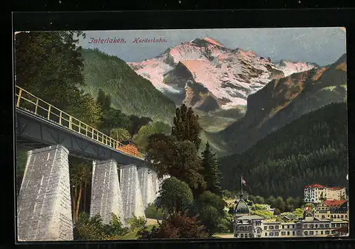 AK Interlaken, Gebäude- und Gebirgspartie an der Harderbahn