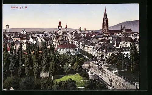 AK Freiburg i. B., Stadtansicht mit Strassenbahn aus der Vogelschau