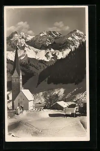 AK Mittelberg, Ortsansicht mit Schafalpköpf im Winter