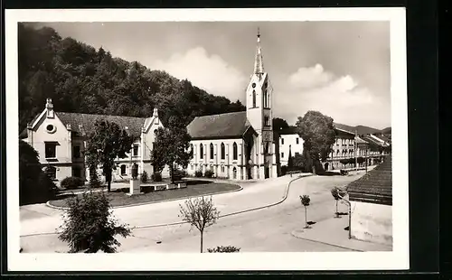 AK Dolný Kubín, Strassenpartie mit Kirche