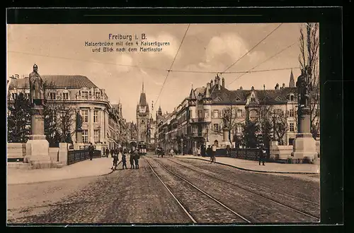 AK Freiburg i. B., Strassenpartie mit den vier Kaiserfiguren