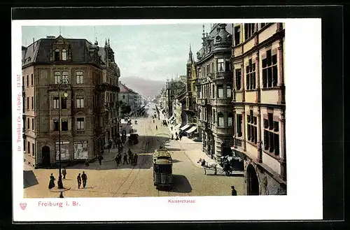 AK Freiburg i. Br., Kaiserstrasse mit Kutsche und Strassenbahn