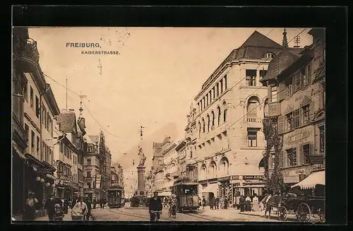 AK Freiburg, Kaiserstrasse mit Strassenbahnen