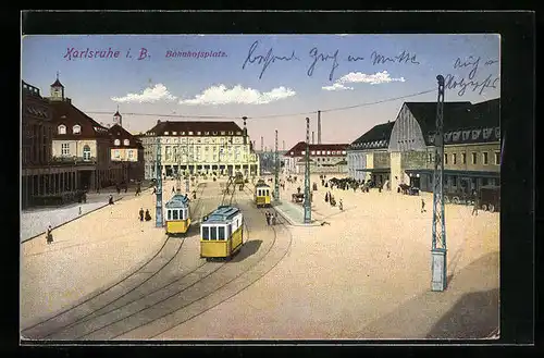 AK Karlsruhe i. B., Bahnhofsplatz mit Strassenbahn