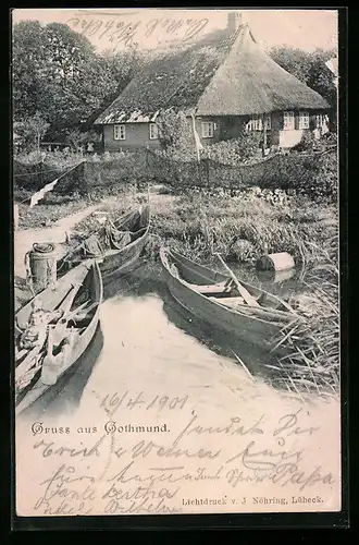 AK Gothmund, Ortspartie mit Booten und Reetgedecktem Haus
