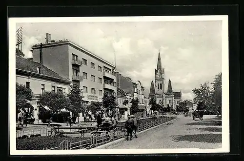 AK Mukacevo, Strassenpartie mit Kirche