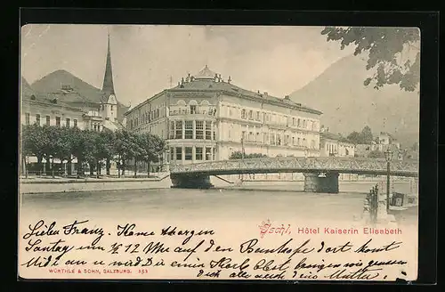AK Ischl, Brücke vor dem Hotel Kaiserin Elisabeth, Blick zur Kirche