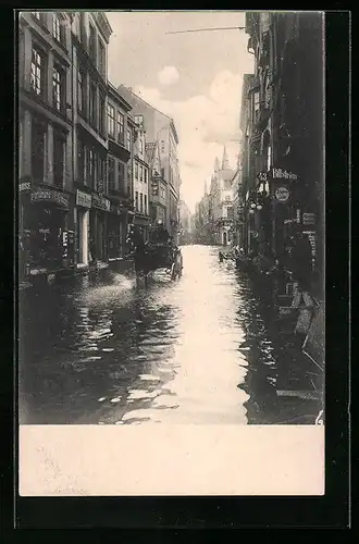 AK Kiel, Die Sturmflut 1904, Holstenstrasse mit Geschäften und Pferdewagen, Unwetter