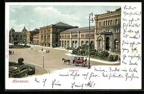 AK Hannover, Bahnhof mit Pferdekutsche und Denkmal