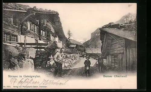 AK Gsteigwiler /Berner Oberland, Strassenpartie mit Anwohnern