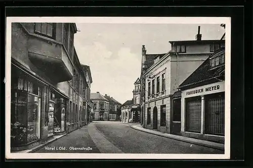 AK Varel i. Old., Obernstrasse mit Geschäften