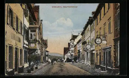 AK Stockach, Hauptstrasse mit Friseurgeschäft und Apotheke