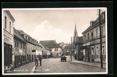 AK Wilsdruff /Sa., Dresdner Strasse mit Büchsenmacherei Rost und Kirche
