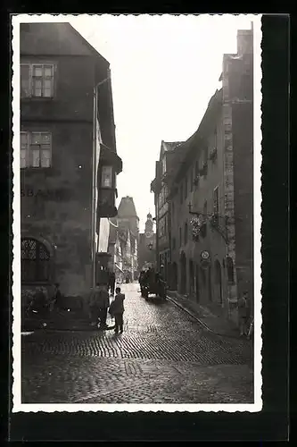 Foto-AK Rothenburg /Tauber, Strassenpartie nach Gewitterregen