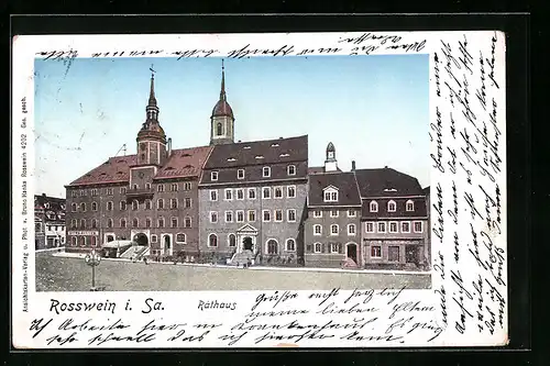 Goldfenster-AK Rosswein i. Sa., Blick auf das Rathaus mit leuchtenden Fenstern