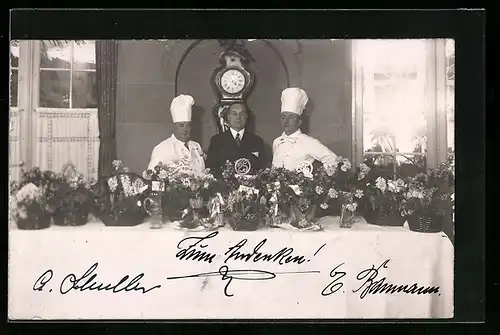 AK Köche nehmen eine Auszeichnung entgegen