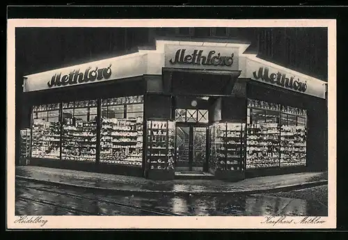 AK Heidelberg, Kaufhaus Methlow bei Nacht, Strassenansicht