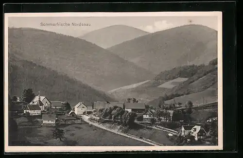 AK Nordenau, Blick auf den kleinen Ort und die Kapelle