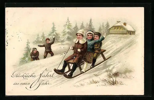 AK Kinder fahren auf einem Schlitten ins neue Jahr