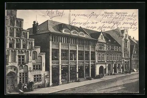 AK Husum, Grossstrasse mit Geschäft und Thomas Hotel